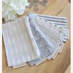 Lot de 5 porte monnaie  aux teinte grise et blanches